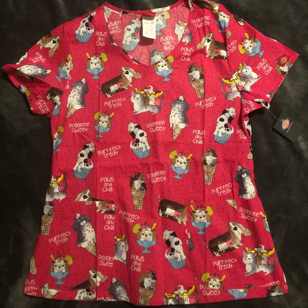 Scrub top, brand new never been worn and still has the tags on.